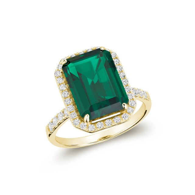 Bague en pierre précieuse et diamant taille émeraude