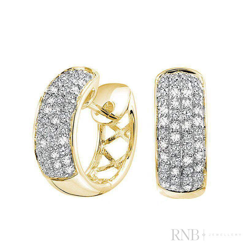 Boucles d'oreilles Huggie pavées de diamants