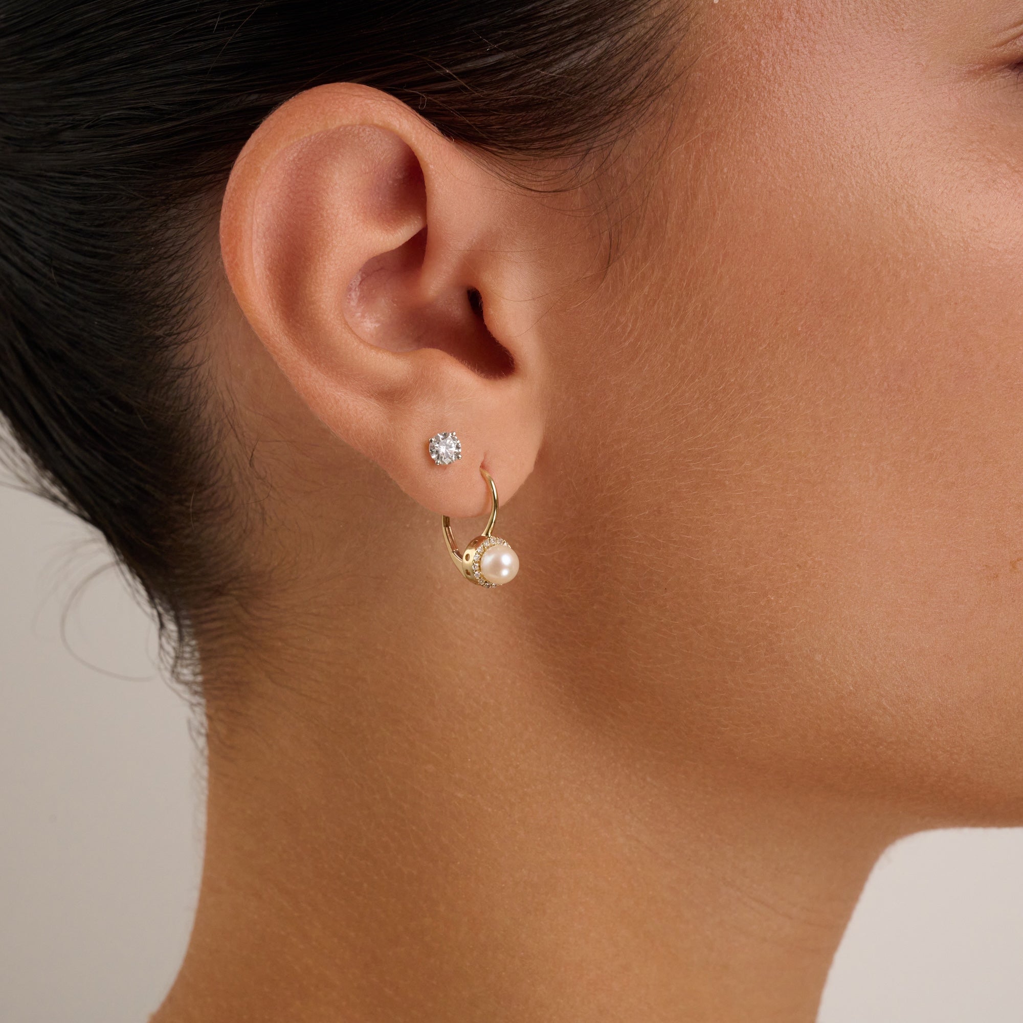 Boucles d'oreilles pendantes en perles de culture et halo de diamants