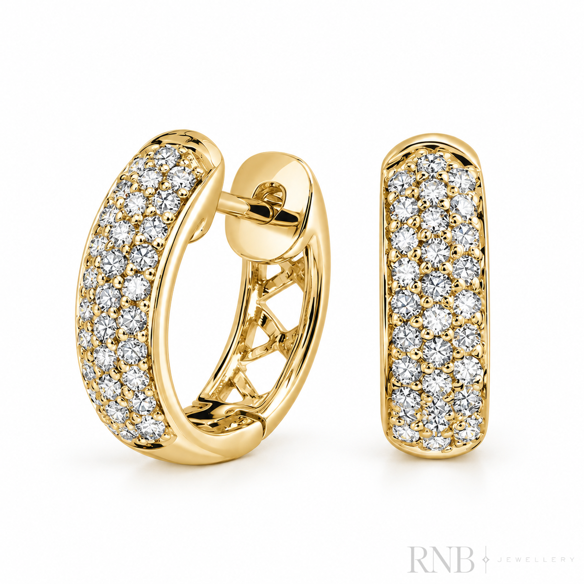 Boucles d'oreilles Huggie pavées de diamants
